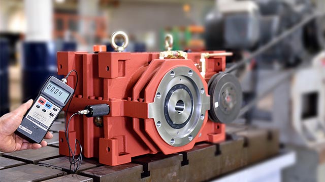 Custom gearbox undergoing testing with precision measuring equipment at SUN LUNG GEAR